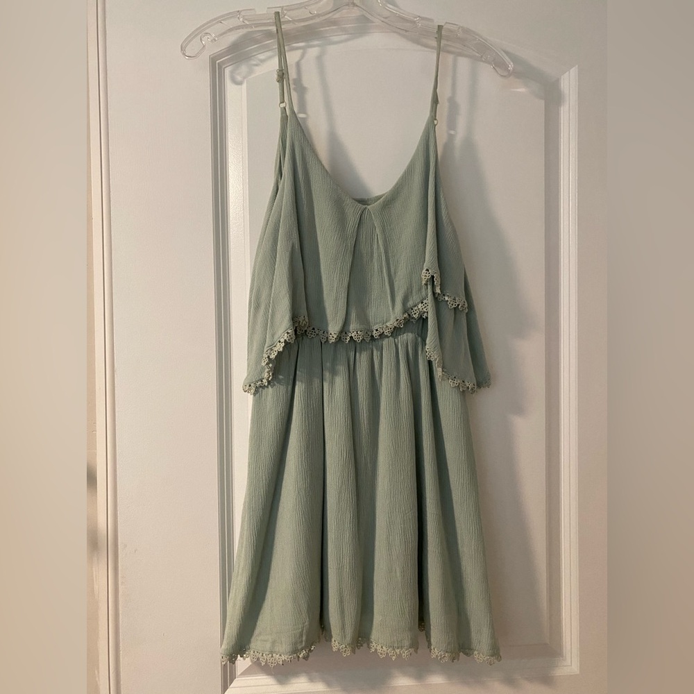 Cute bluish green dress with trim